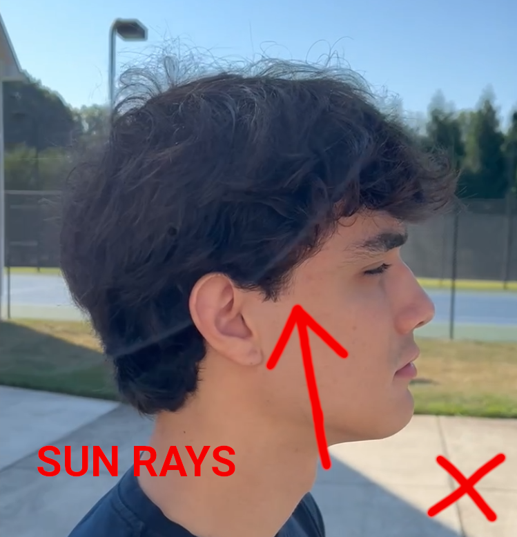 image of rays of light distorting bust video